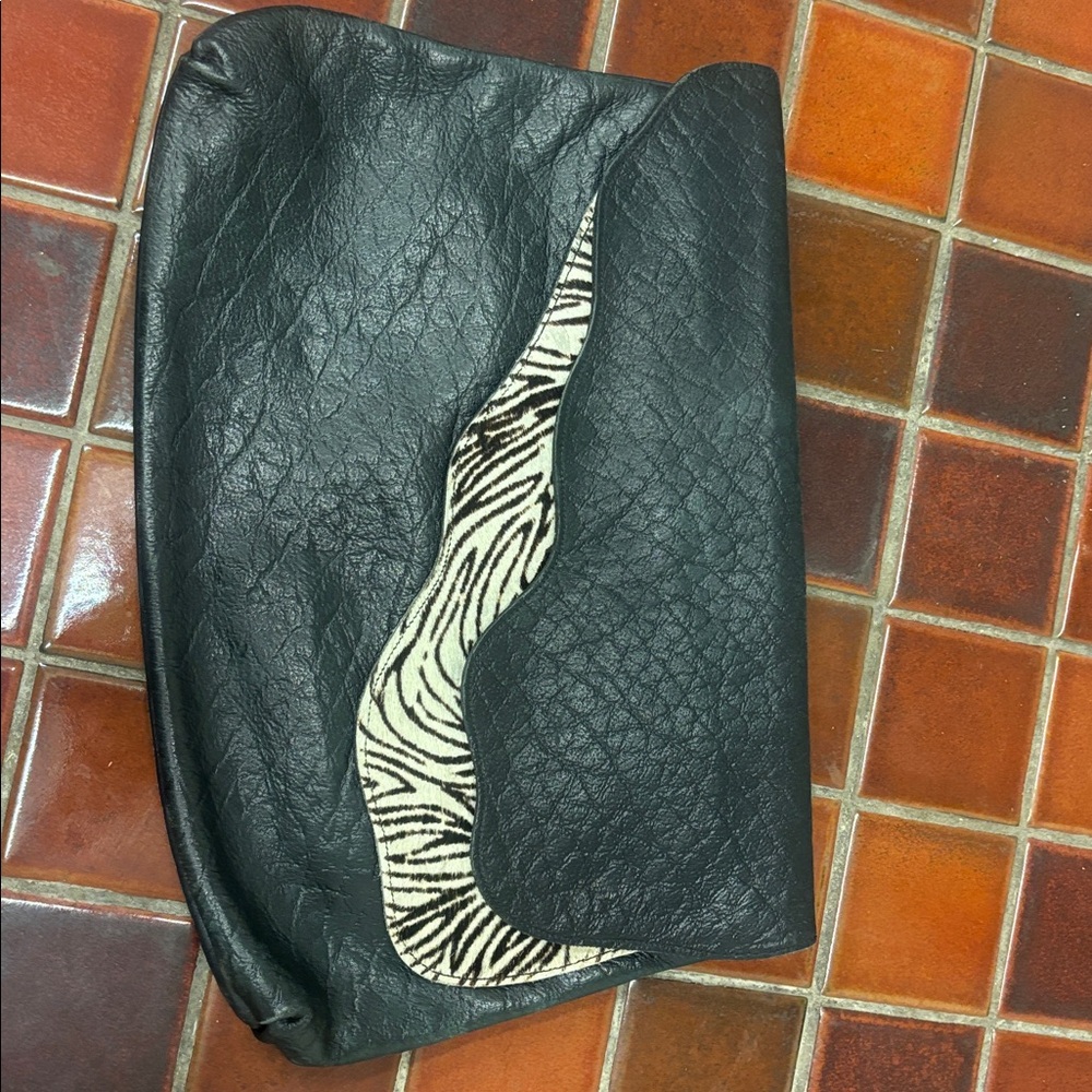 Vintage Gino Leather made in USA Large Clutch Purse black w/zebra pattern.